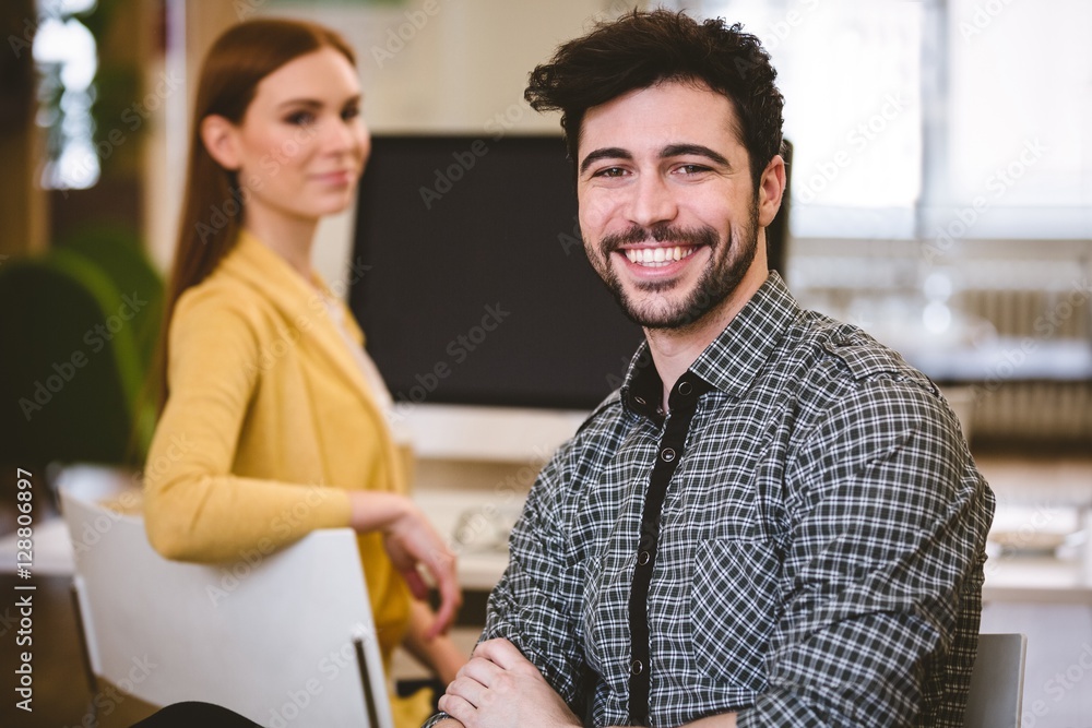 Happy businessman with female coworker Happy businessman with female coworker