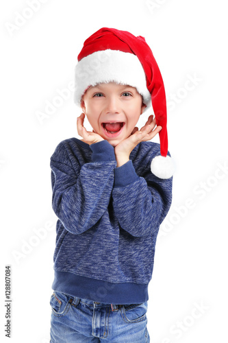 Cute little boy in Santa ha...