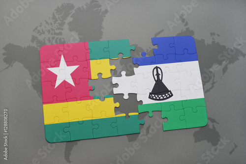 puzzle with the national flag of togo and lesotho on a world map