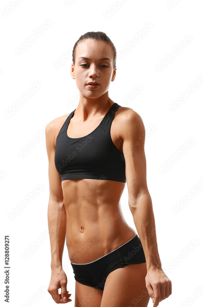 Sporty young woman posing isolated on white Sporty young woman posing isolated on white