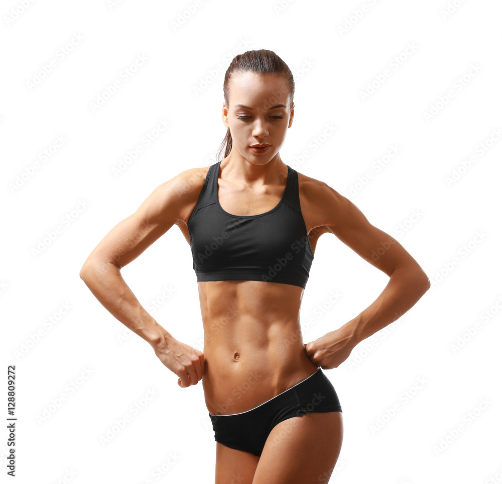 Sporty young woman posing isolated on white Sporty young woman posing isolated on white