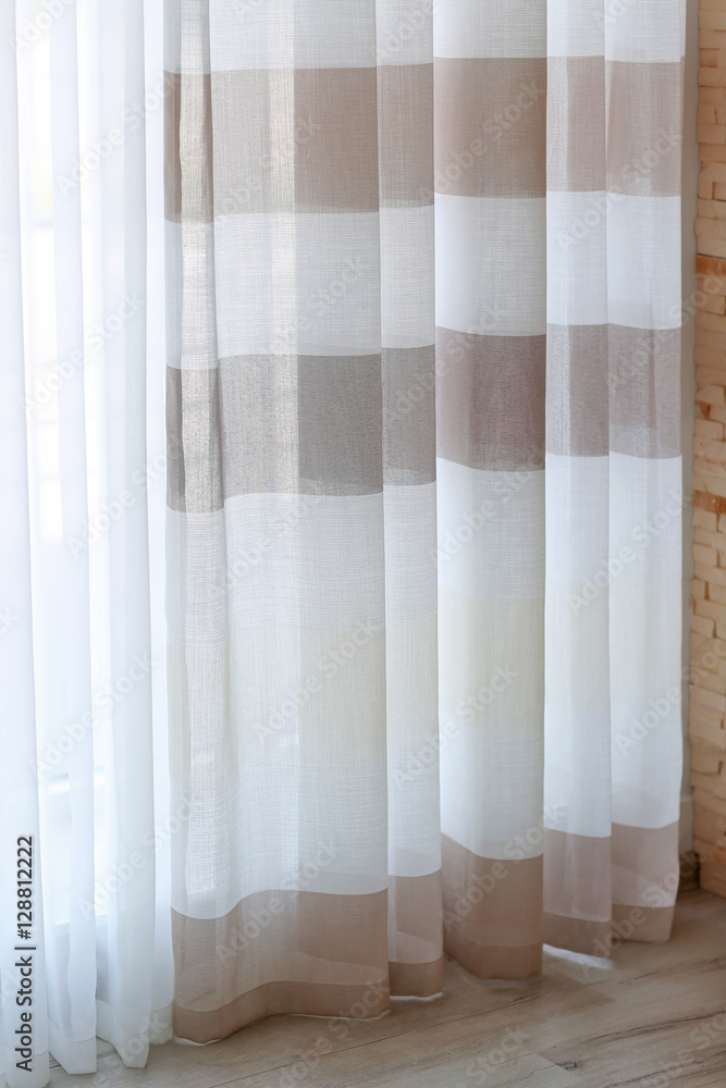 Room window with colorful striped curtains Room window with colorful striped curtains