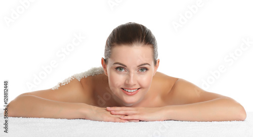 Young woman with scrub on b...