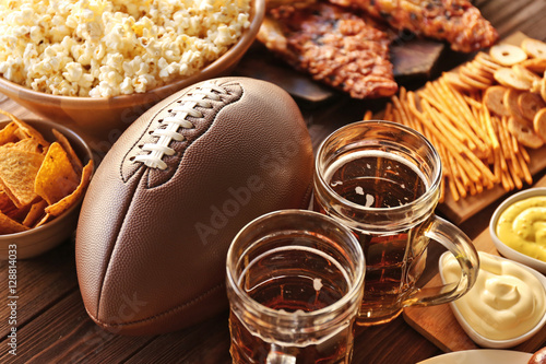 Εκτύπωση καμβά Table full of tasty snacks and beer prepared for watching rugby on TV