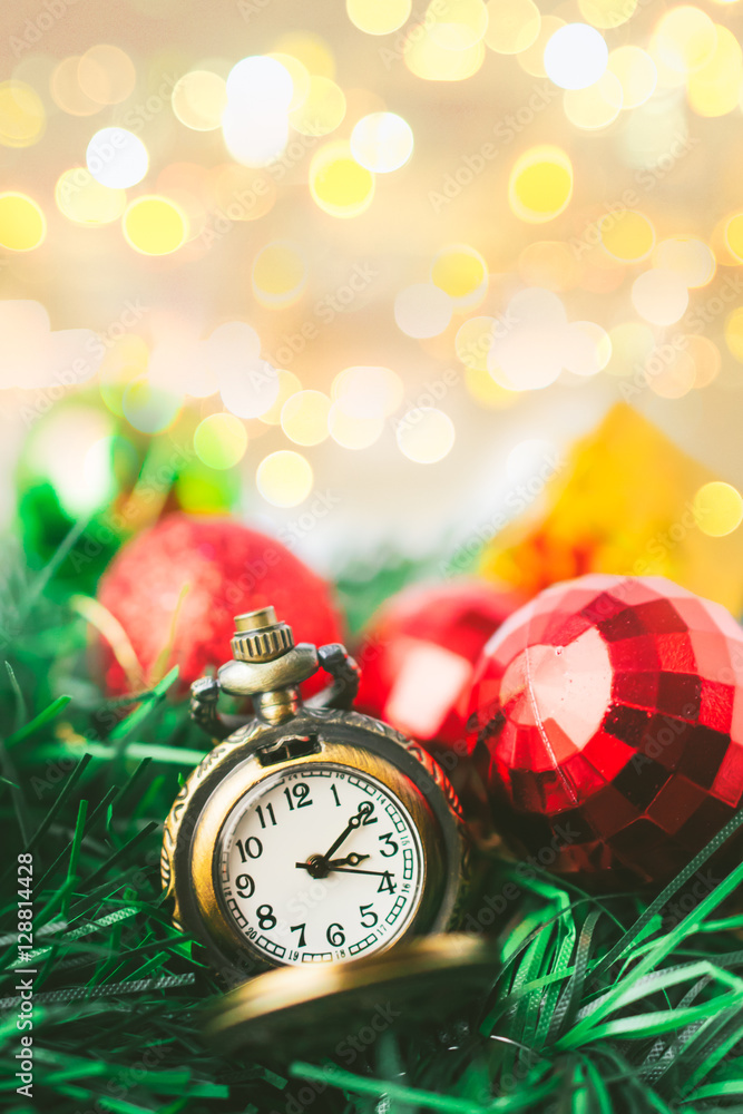 Christmas Pocket Watch with Ball and Gift Box in Blur Background Christmas Pocket Watch with Ball and Gift Box in Blur Background