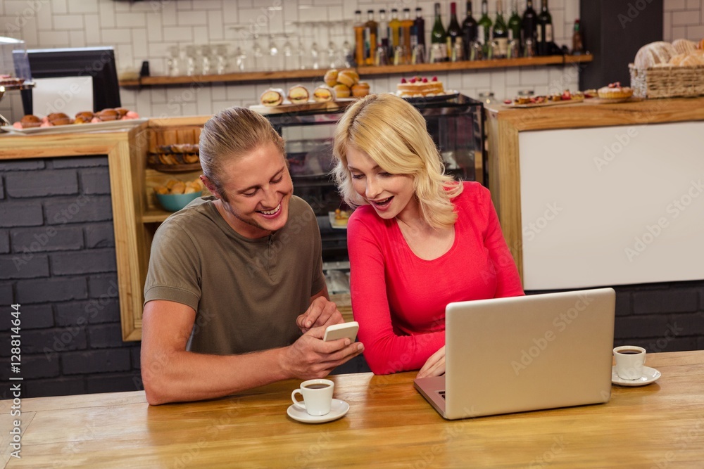Couple using technology