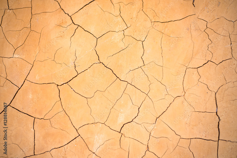 Brown clay earthen wall texture or background Brown clay earthen wall texture or background