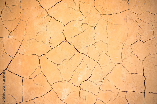 Brown clay earthen wall texture or background