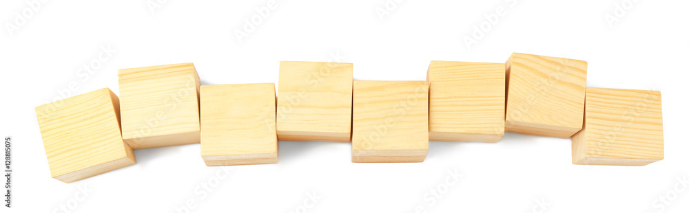 Empty wooden cubes on white background