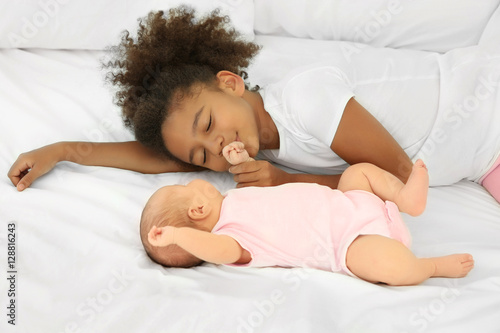 Cute baby and elder sister ...