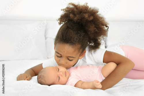 Cute baby and elder sister ...