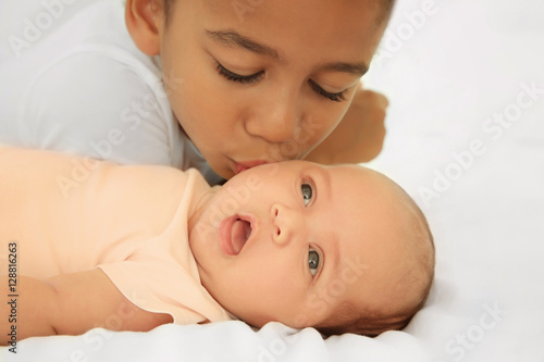 Cute baby and elder sister ...