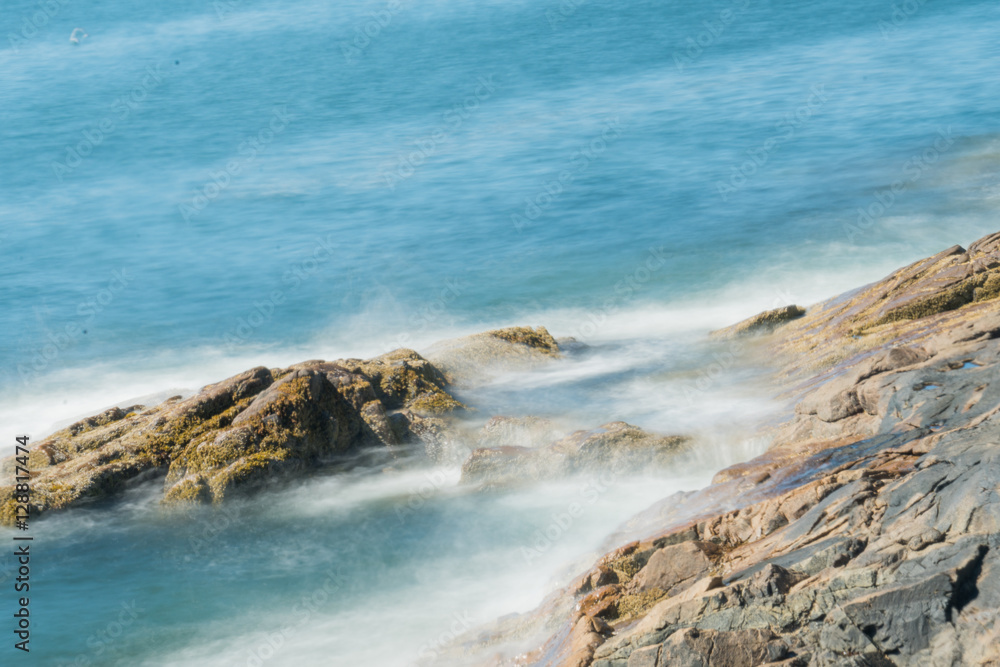 Long Exposure of surf crashing into Otter Cliffs in Acadia National Park