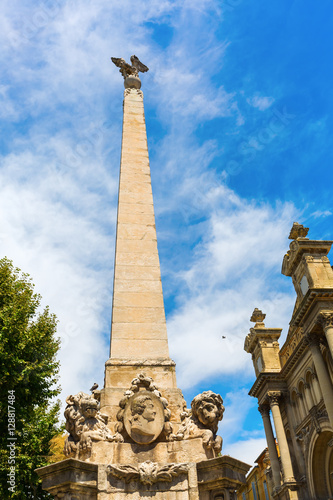 Obelisk in front of the Eglise de la Madeleine in Aix en Provence photo