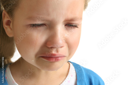 Portrait of crying little g...