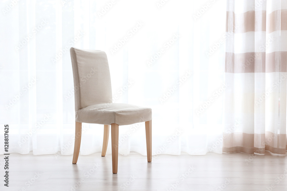 Chair on curtain background Chair on curtain background