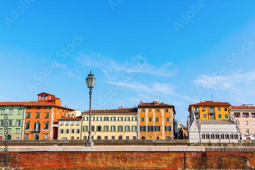 cityscape with river Arno of Pisa