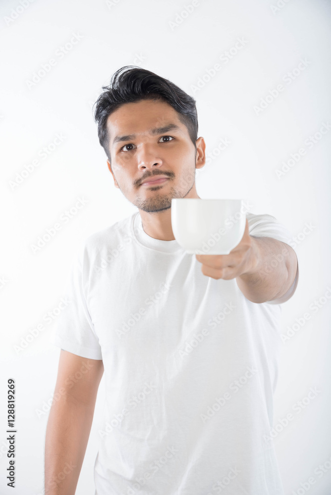 Portrait of happy young man drinking coffice on white background Portrait of happy young man drinking coffice on white background