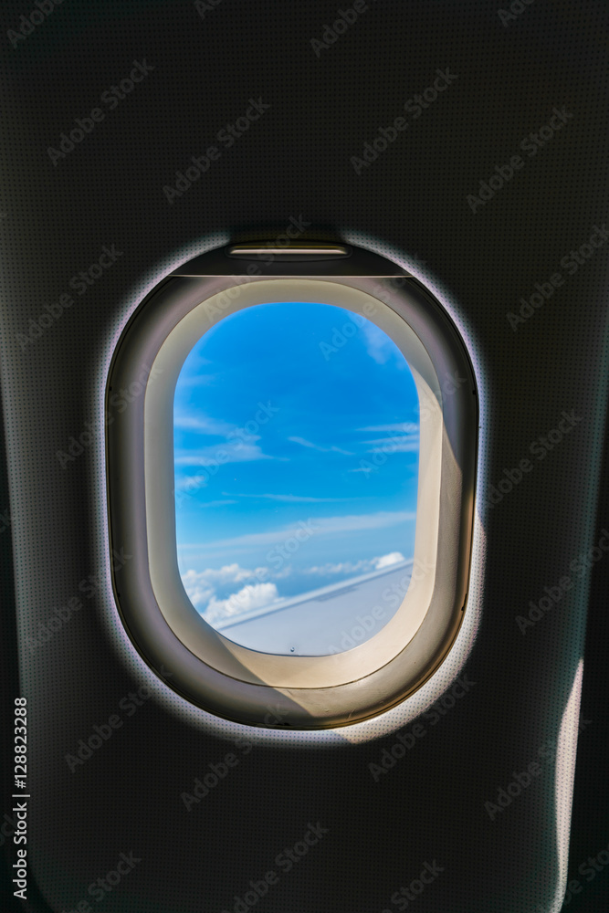 Fototapeta premium Plane window with cloud view .