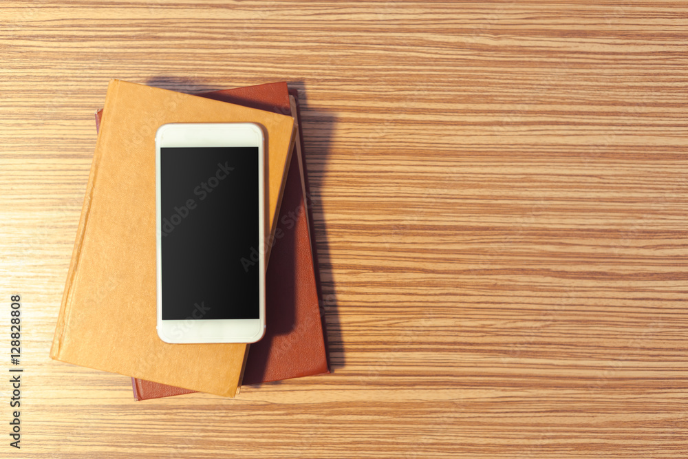 Smartphone on wooden table Smartphone on wooden table