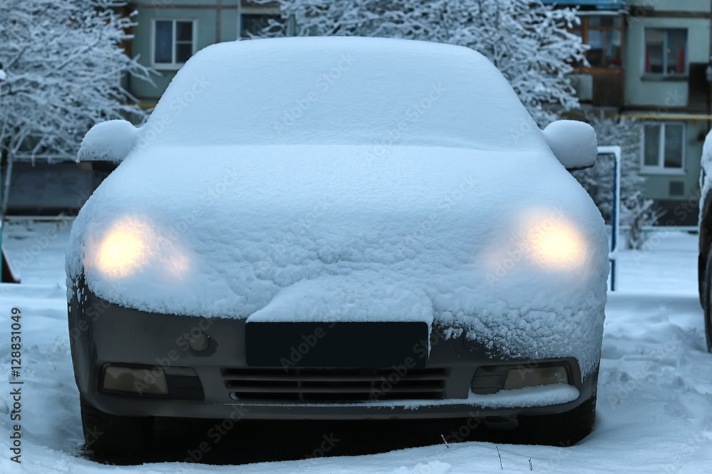 Obraz premium car covered snow