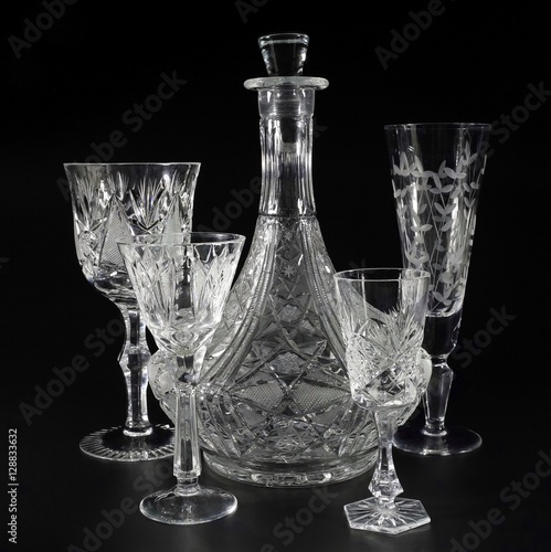 Utensils from crystal on a black background. 2
