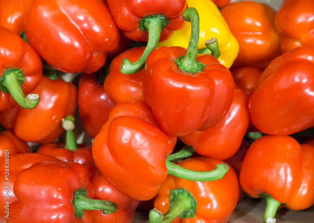 Red sweet peppers in the box on super market shelf, Colorful sweet peppers 