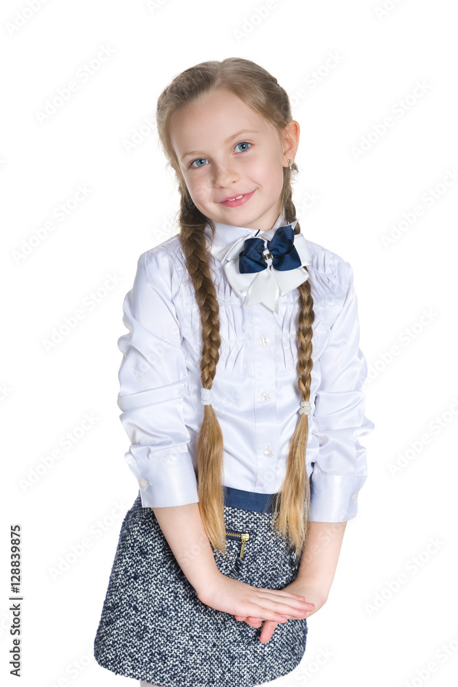 Smiling schoolgirl against the white Smiling schoolgirl against the white