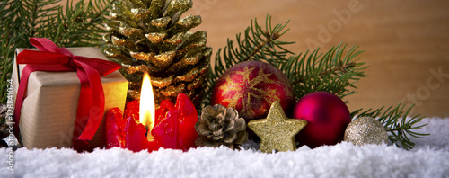 Advent candle and gift box. photo