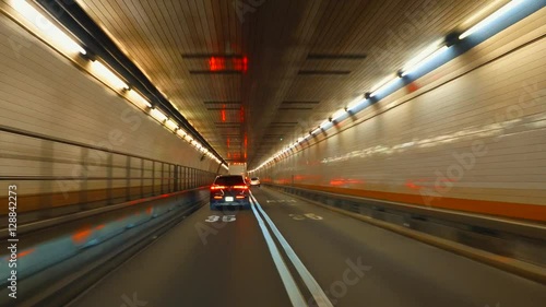 Driving in a tunnel with car mounted camera photo