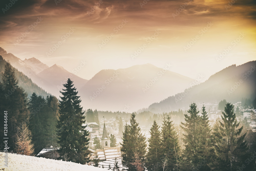 Obraz premium Beautiful mountain landscape. Silhouettes of tall spruce trees a