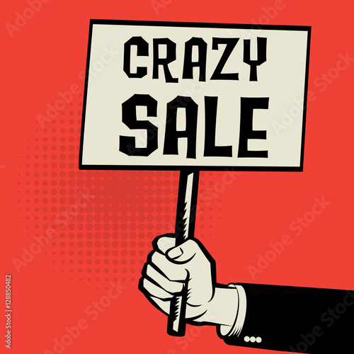 Poster in hand, business concept with text Crazy Sale