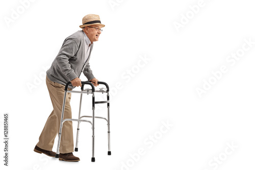 Fototapeta Senior walking with a walker