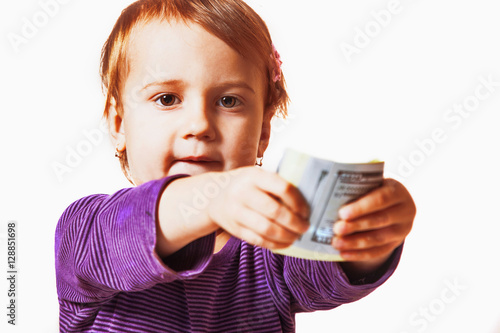 baby girl is giving you dollars banknotes (money, success, payme photo