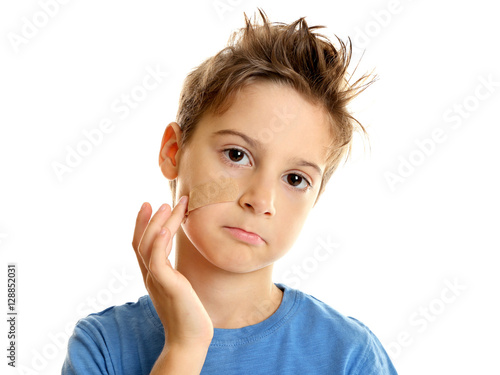 Cute little boy with sticki...