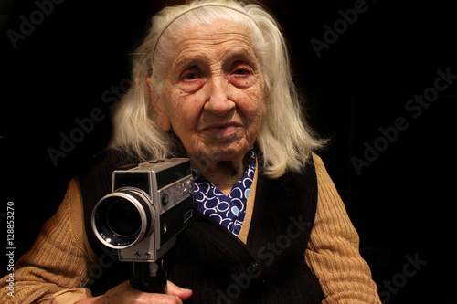 фотографія Grandmother with camera