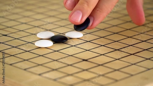 Chinese go game weiqi playing slow motion.
