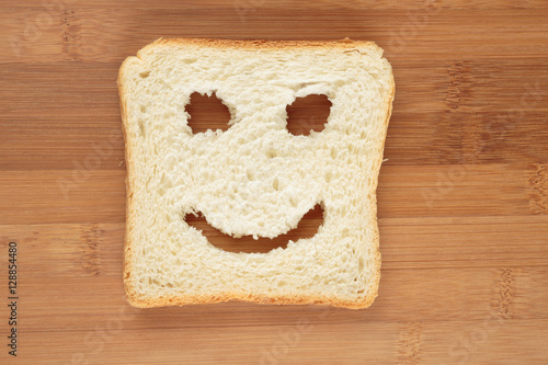 Happy toast with a fork in her mouth