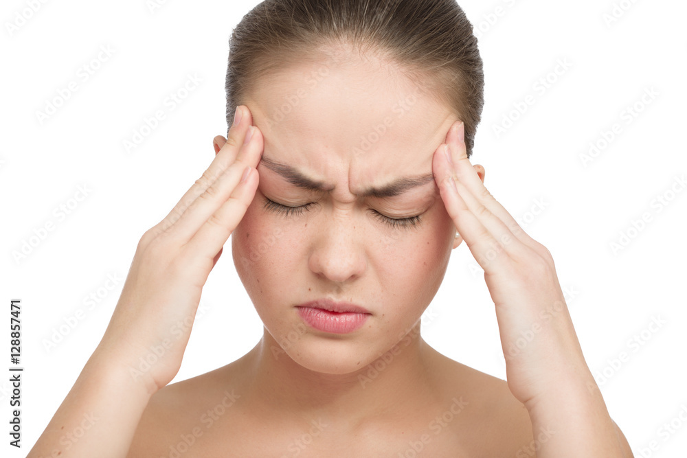 Beautiful young woman with headache touching her temples, isolated in white Beautiful young woman with headache touching her temples, isolated in white