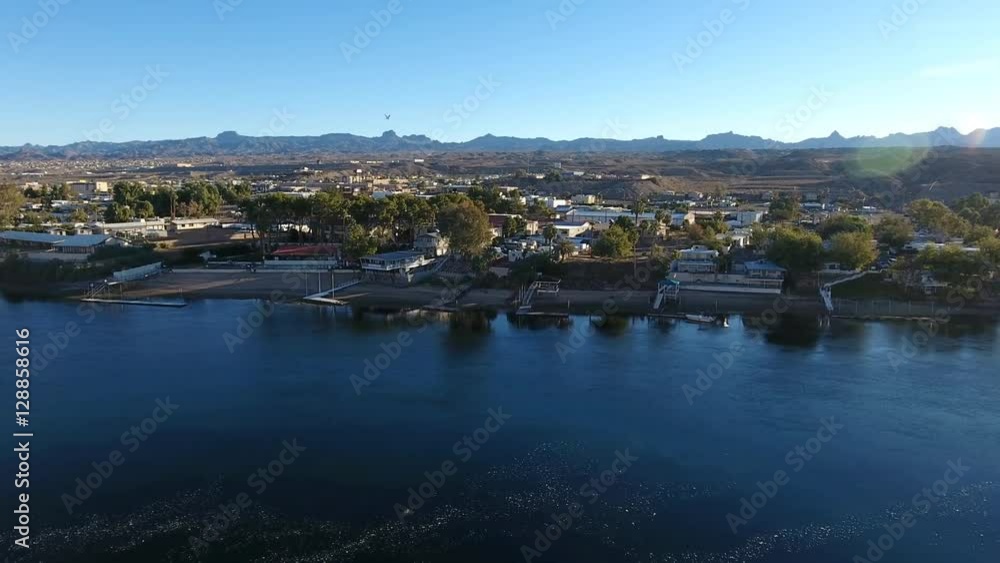 Aerial view of houses along the Colorado River in a small town Aerial view of houses along the Colorado River in a small town