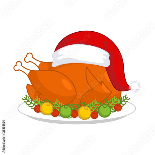 Christmas turkey in Santa Claus cap. Roast fowl on plate with ve
