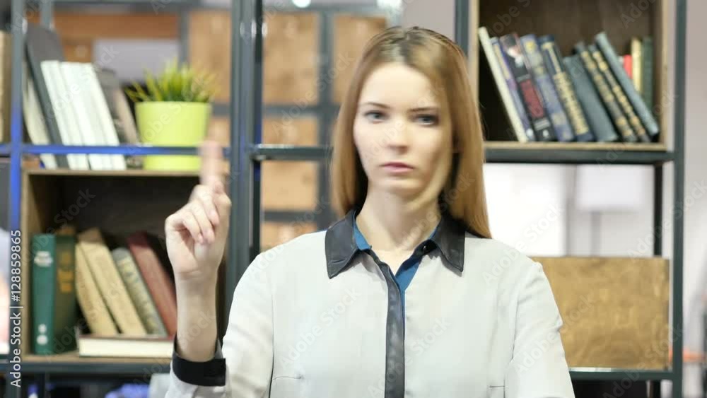 Woman Showing No by Waving fingers, Indoor Office Woman Showing No by Waving fingers, Indoor Office