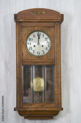 Vintage chiming wall clock on midnight at Christmas