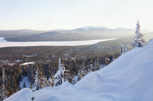 View from mountain range Zyuratkul, winter sunset landscape.