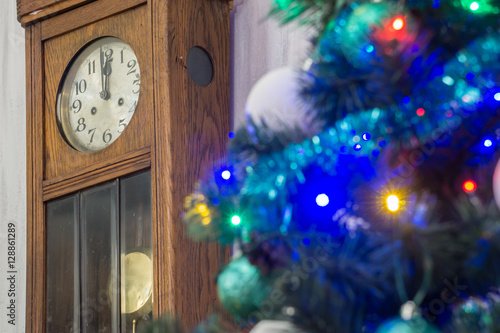 Valokuva Vintage chiming wall clock on midnight at Christmas