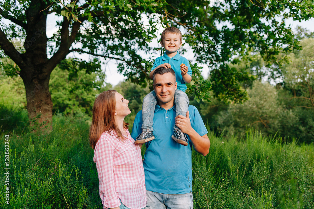 happy family walking in the park playing happy family walking in the park playing