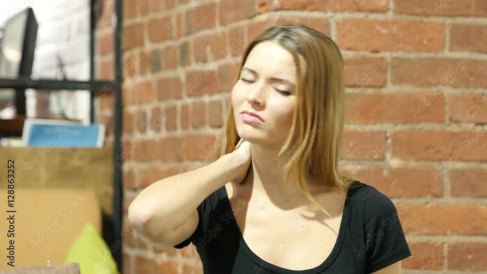 Tired Beautiful Woman Portrait, Neck pain, Indoor Tired Beautiful Woman Portrait, Neck pain, Indoor