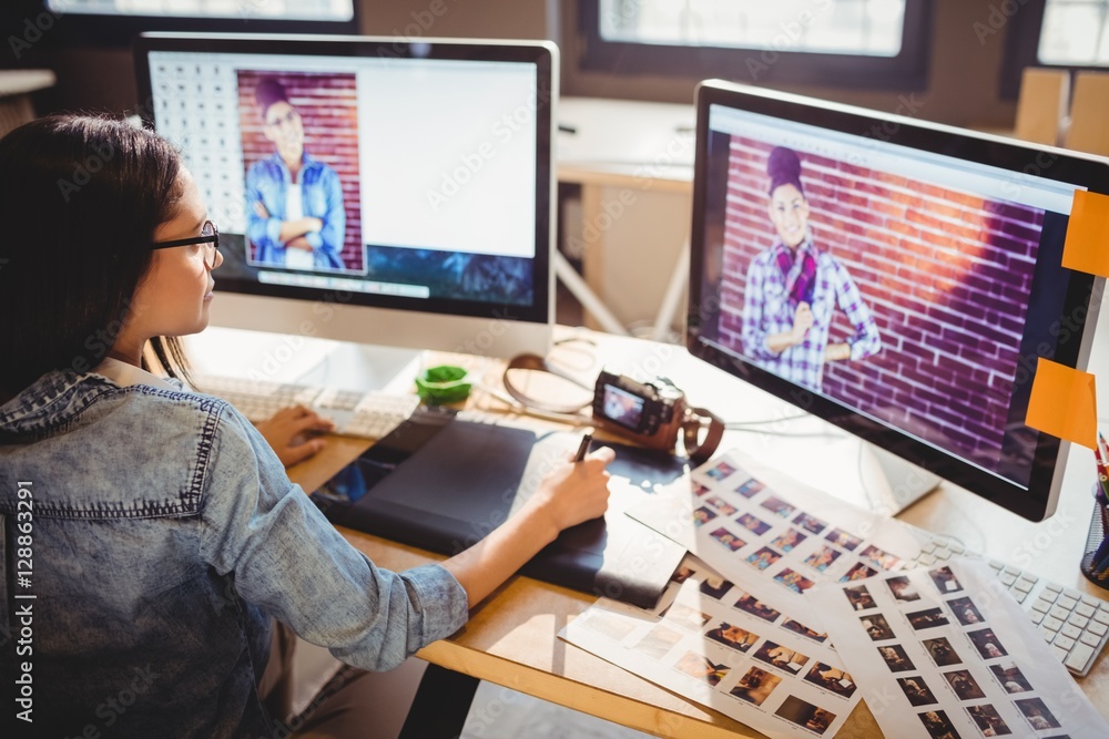 Graphic designer using graphics tablet Graphic designer using graphics tablet