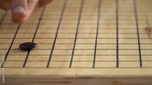 Chinese go game weiqi playing slow motion.