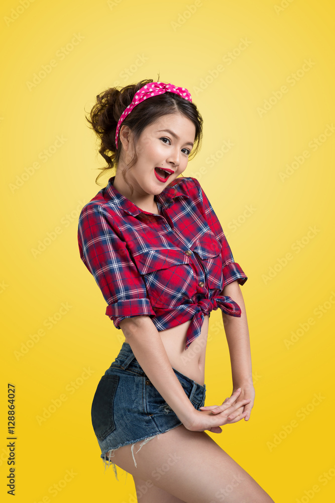 Lovely woman retro portrait with pin-up make-up and hairstyle p Lovely woman retro portrait with pin-up make-up and hairstyle p